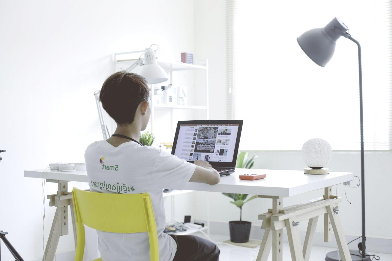 Financial planning workspace with laptop and documents